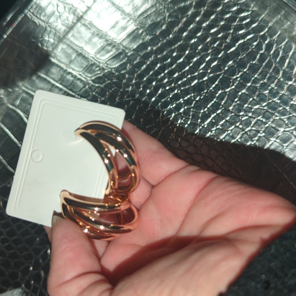 Pierced Gold tone earrings